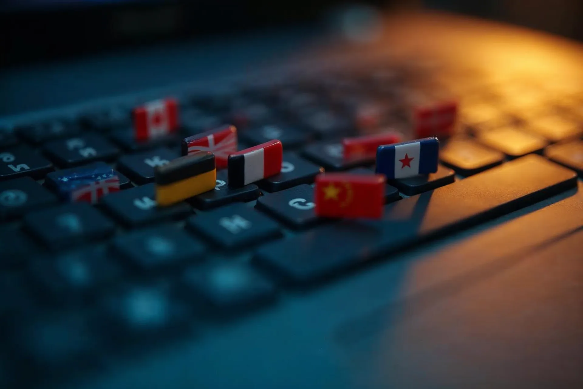 Keyboard with flag icons for language selection in chatbots.
