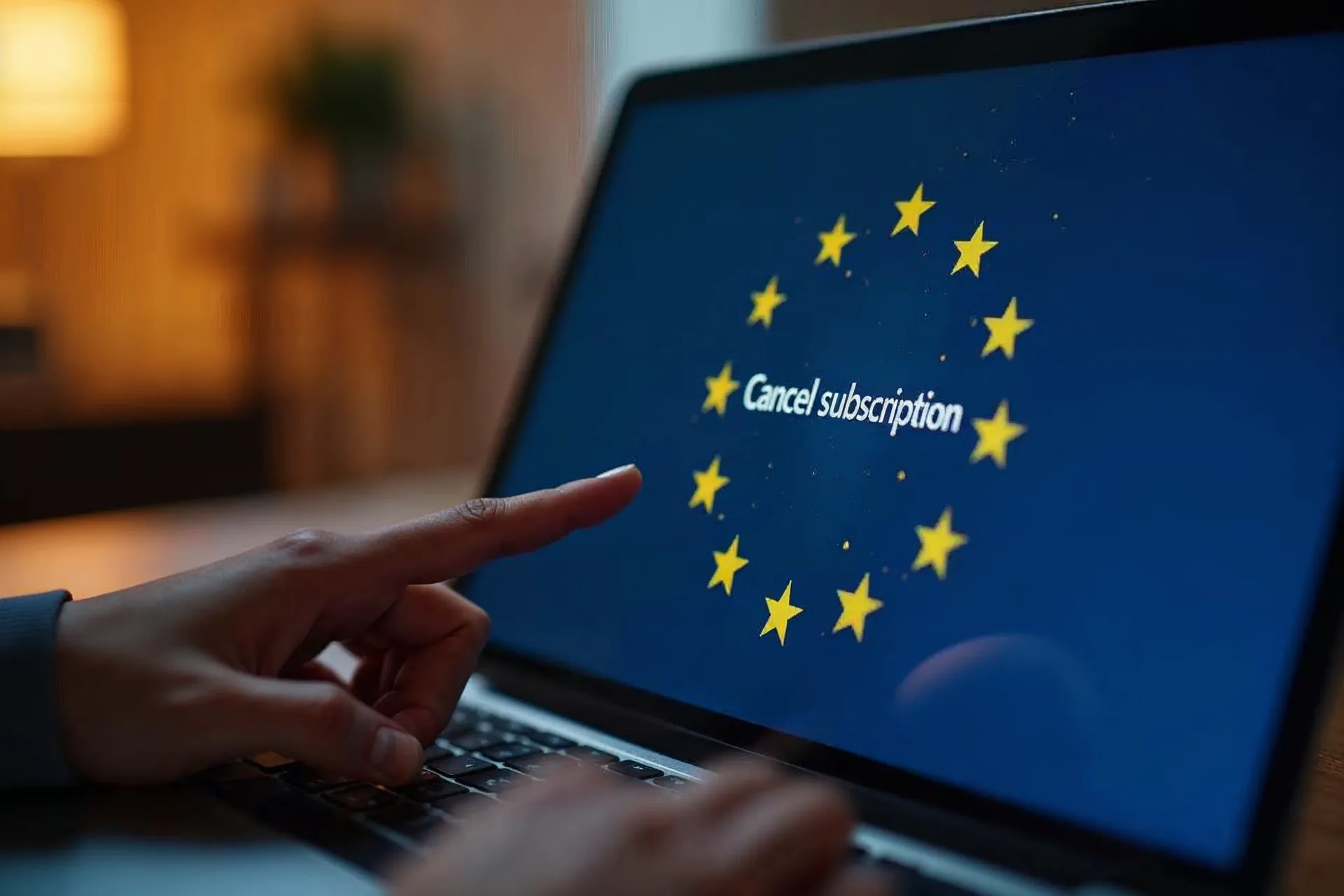 Άτομο κάνει κλικ στο κουμπί ακύρωσης συνδρομής σε φορητό υπολογιστή με σημαία της ΕΕ.